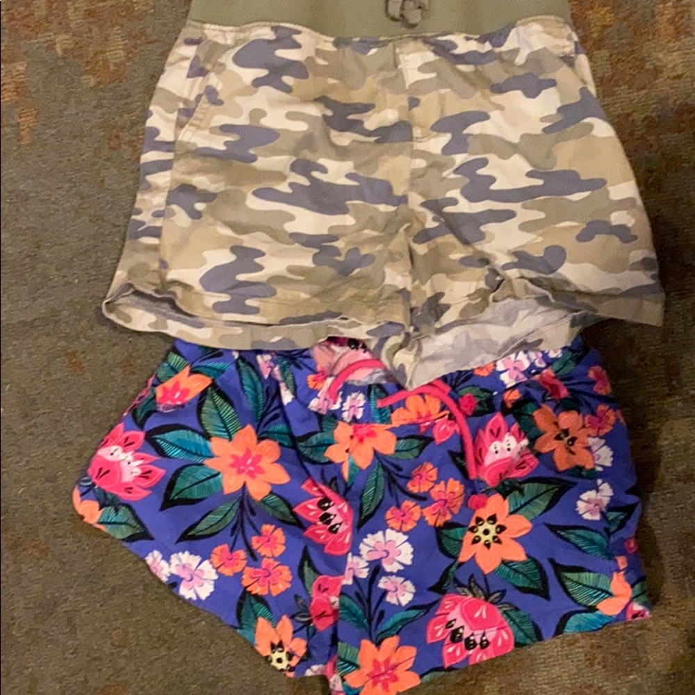 2 pairs of shorts one Gymboree and children place.